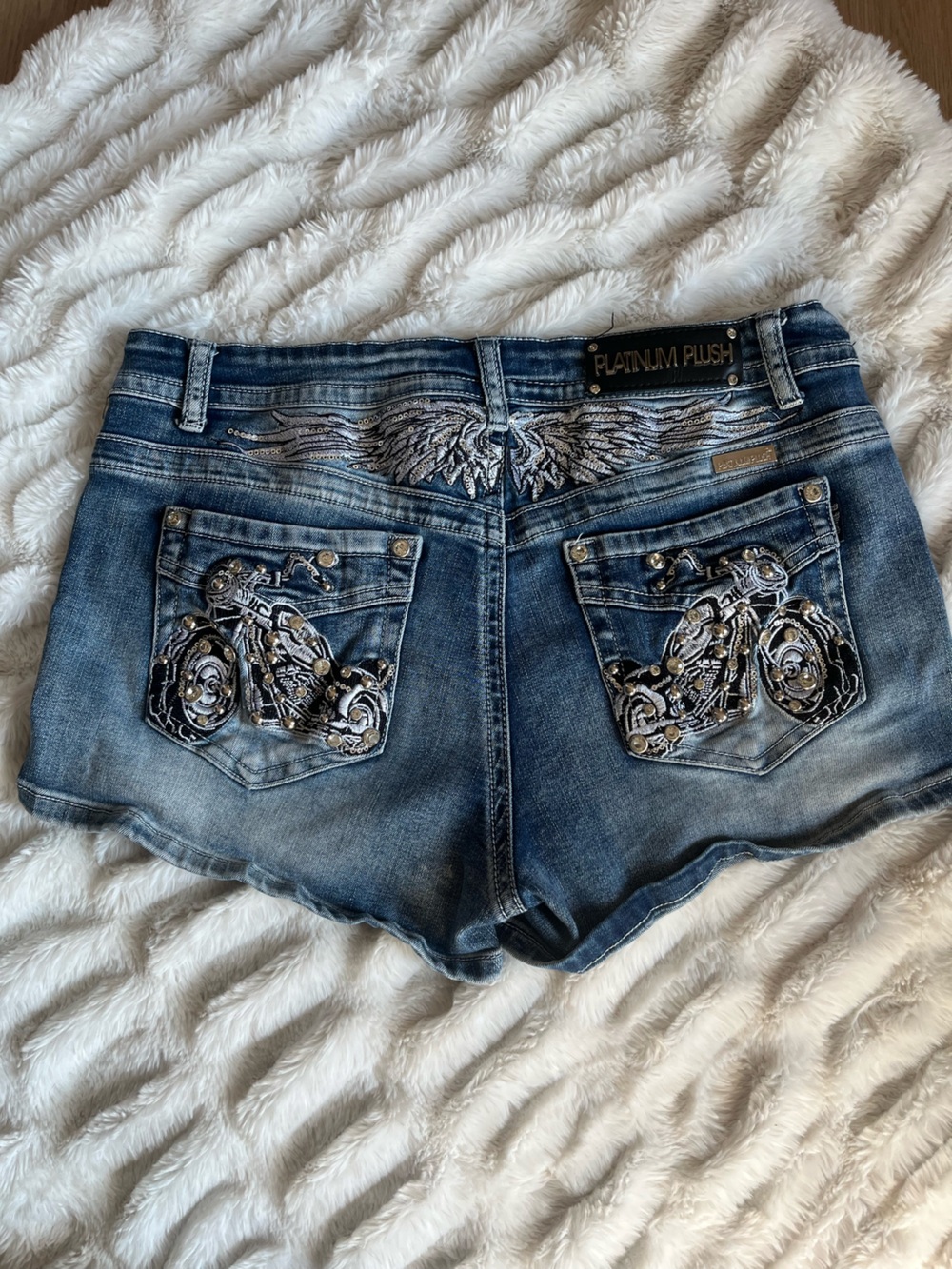 Platinum Plush Bedazzled Jean shorts with motorcycle decal
